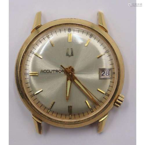 JEWELRY. Men's Bulova Accutron 18kt Gold watch.