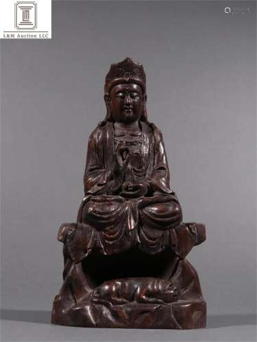 A Chinese Carved Agarwood Guanyin Statue