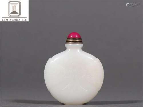 A Chinese Carved Jade Snuff Bottle