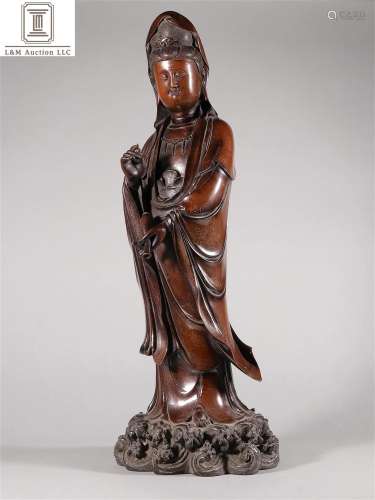 A Chinese Bronze Guanyin Statue