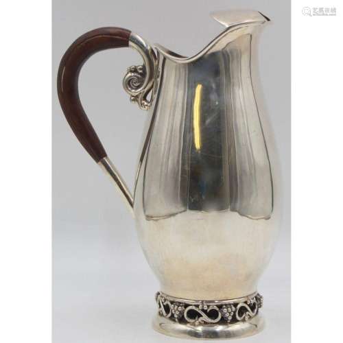 STERLING. Sterling Footed Wine Pitcher.