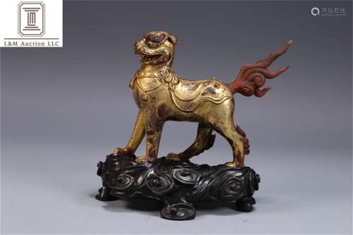 A Chinese Gilt Bronze Beast Shaped Decoration