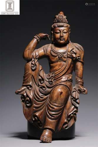 A Chinese Carved Rosewood Guanyin Statue