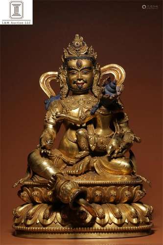 A Chinese Gilt Bronze God of Wealth Buddha Statue