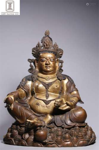 A Chinese Gilt Bronze God of Wealth Buddha Statue