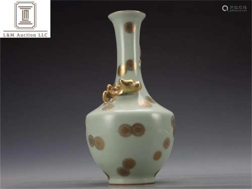 A Chinese Celadon Glazed Porcelain Dragon Vase