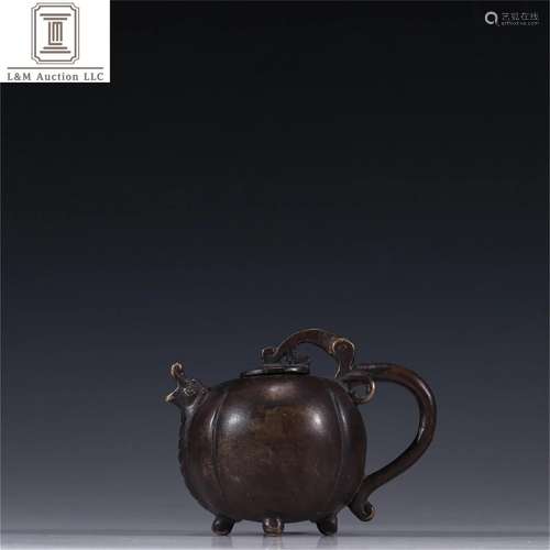 A Chinese Bronze Jar with Handle