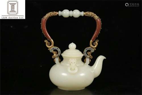 A Chinese Carved Jade Wine Pot with Handle