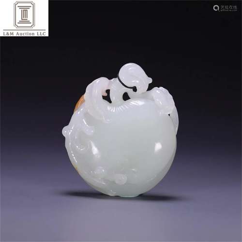 A Chinese Carved Jade Peach Shaped Decoration