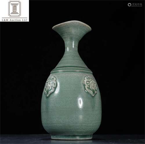 A Chinese Celadon Glazed Porcelain Vase