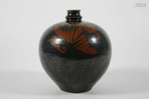 Black Glazed Jar with Rusty Flowers Design