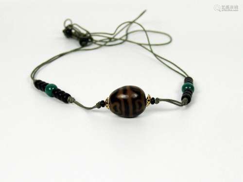 Dzi Bead with Eye of Lotus Flower Design