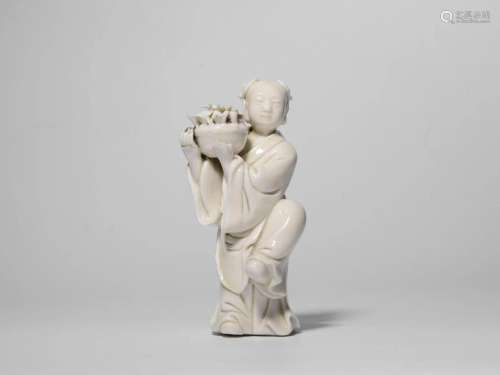 White Glazed Statue of Kid Holding Lotus, Dehua Kiln,