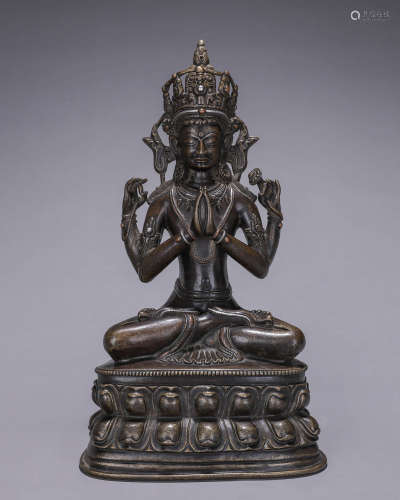 Bronze inlaid silver four-armed Guanyin Bodhisattva