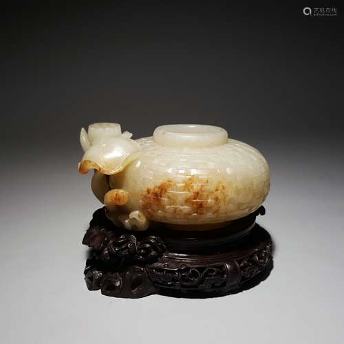 A Hetian jade seed material lotus water pot