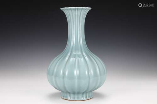 AN Azure glazed melon ridged bottle