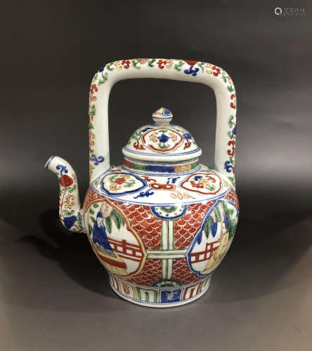 A QING DYNASTY BLUE AND WHITE GLAZED RED LOOP-HANDLED TEAPOT