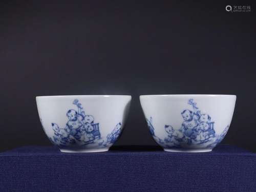PAIR OF BLUE & WHITECHILDREN AT PLAY CUPS