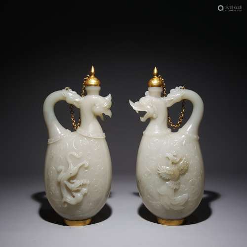 A PAIR OF HETIAN JADE AND SILVER GILT DRAGON AND PHOENIX POT...