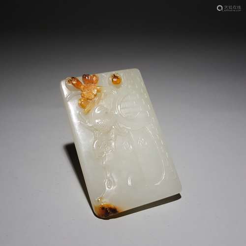 A HETIAN JADE HAPPINESS PENDANT