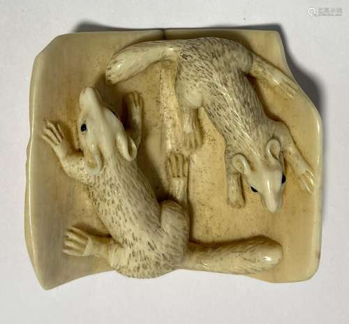 A Japanese Carved Bone Netsuke, depicting Two Squirrels on A...