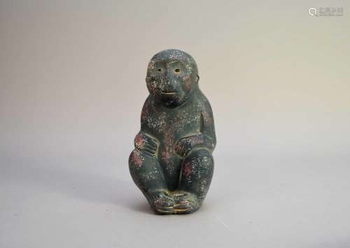 A Chinese Han style stoneware figure of a monkey