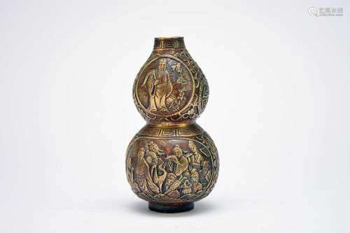 A Chinese bronze double gourd vase