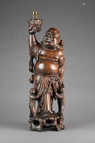 A Chinese carved hardwood laughing Buddha table lamp