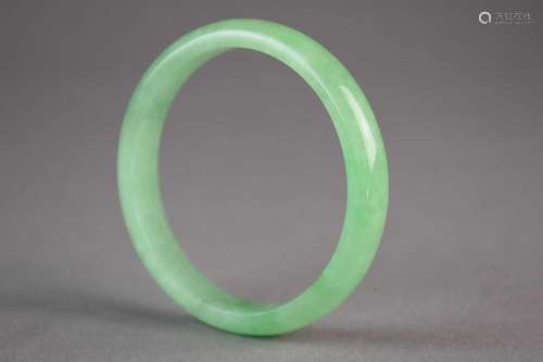 A Chinese jadeite bangle