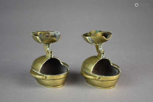 A pair of Chinese brass folding candle holders