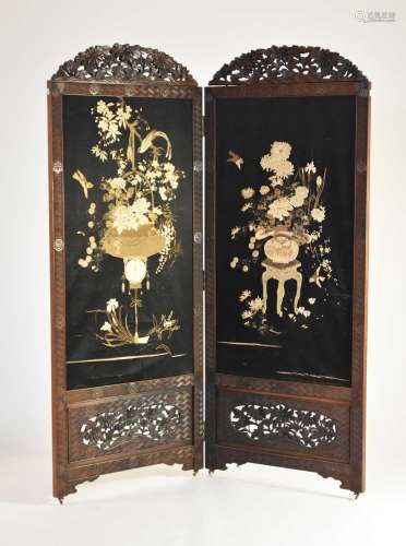 A Japanese hardwood, embroidered and painted two-fold screen