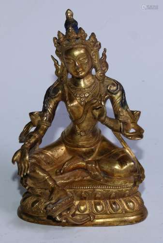A 19th century gilt bronze Tara Buddha, typically seated wit...