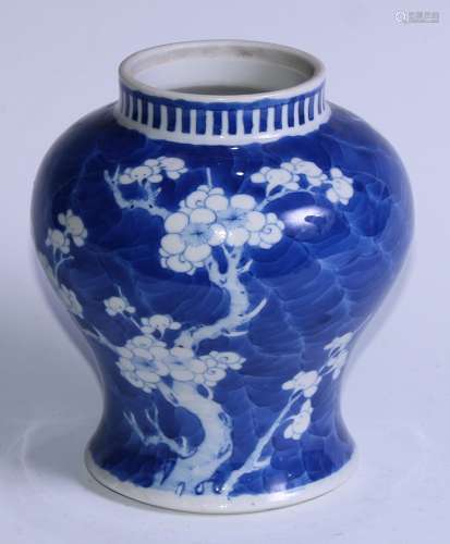 A Chinese baluster jar, painted in tones of underglaze blue ...