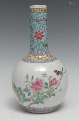A Chinese bottle vase, painted in polychrome with a song bir...
