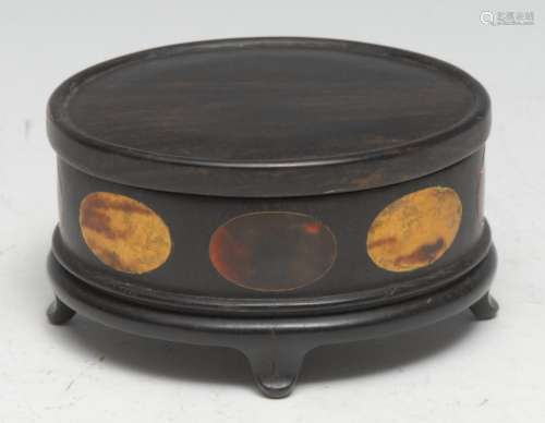 A Chinese hardwood oval box and cover, the side inlaid with ...