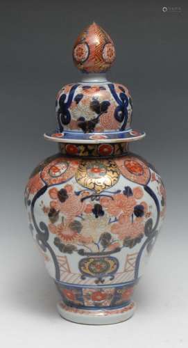 A Japanese porcelain ovoid jar and cover, painted in the Ima...