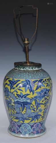 A large Chinese baluster vase, painted in tones of blue and ...