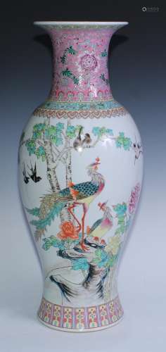 A large Chinese ovoid vase, painted in polychrome with peaco...