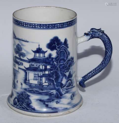 A large Chinese spreading cylindrical mug, pained in tones o...