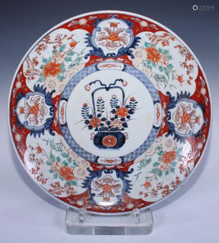 A large Japanese Imari charger, painted with a basket of chr...