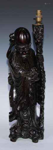 A late 19th century Chinese hardwood figure, now as a table ...