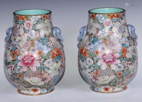A pair of good Chinese 1000 flowers ovoid vases, powder blue...