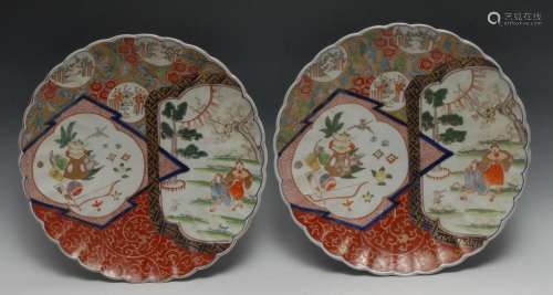 A pair of Japanese Imari shaped circular chargers, 39cm diam...