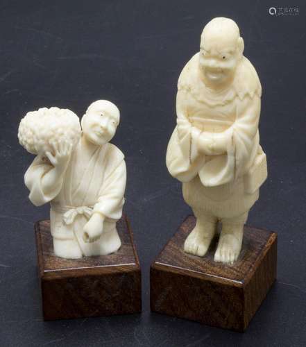 Zwei Netsuke mit Männern / Two netsuke with men, Japan, wohl...