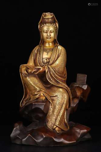 A Gilt-Bronze Figure Of Avalokiteshvara