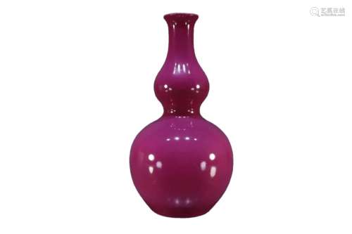 A Red Glazed Gourd Vase