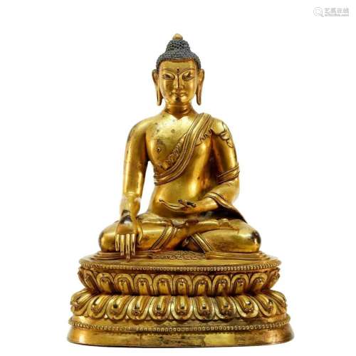 A finely made gilt bronze Sakyamuni statue