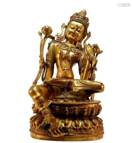 An exquisite gilt bronze Guanyin statue