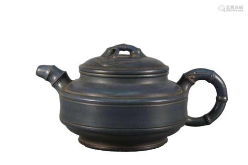 A Yixing Clay Glazed Ewer