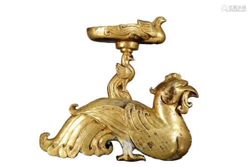 A Gilt-Bronze Candlestick